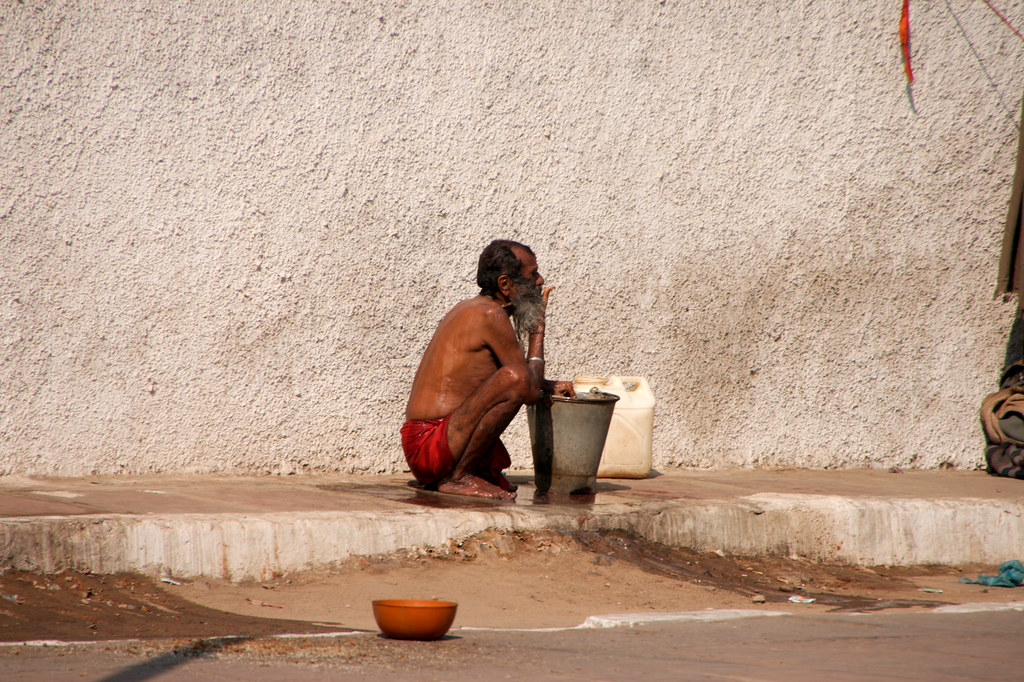Urban shower This guy was taking a urban shower in downtow… Flickr