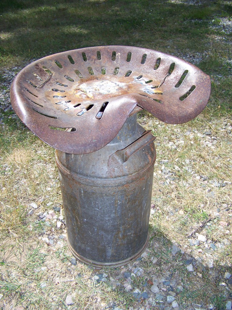 100_0875 milk can and tractor seat Bill Morris Flickr