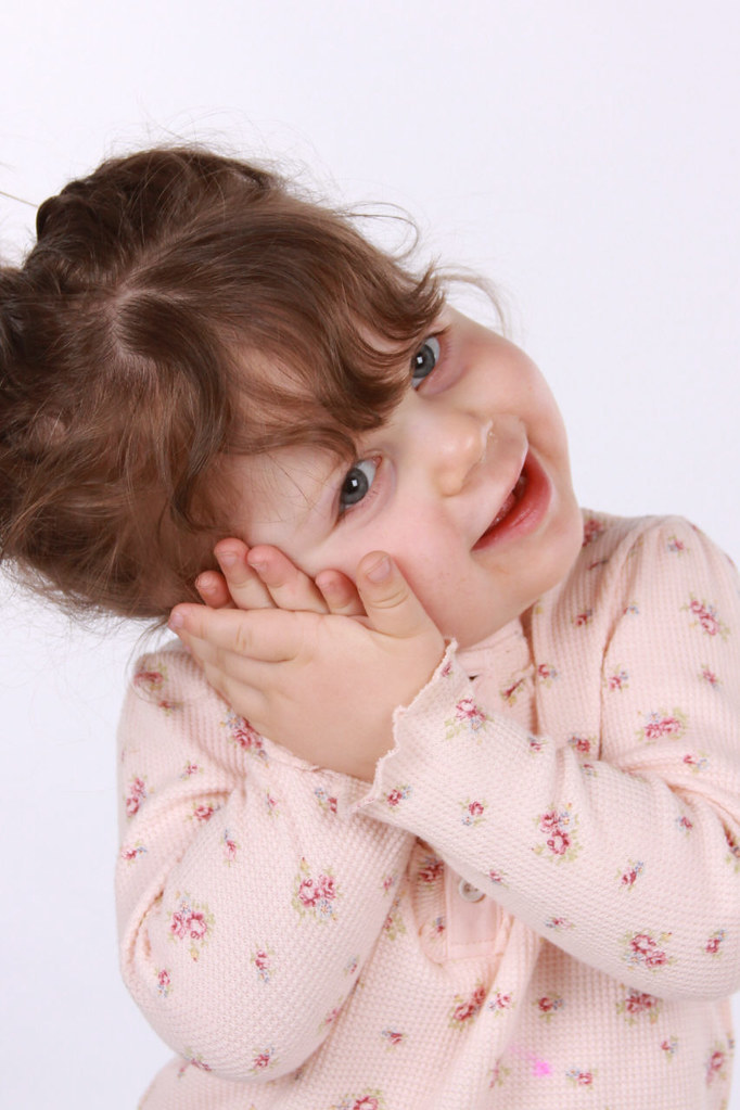 Toddler signing "Sleep" baby sign language PortraitBug NYC