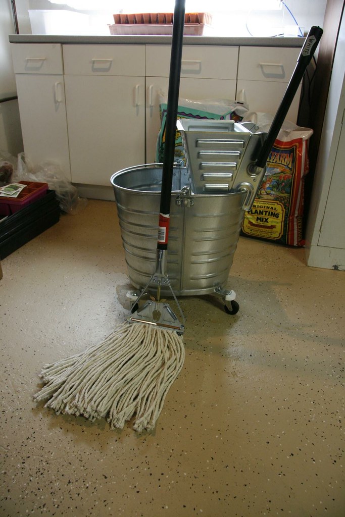 White metal mop bucket White metal mop bucket Flickr