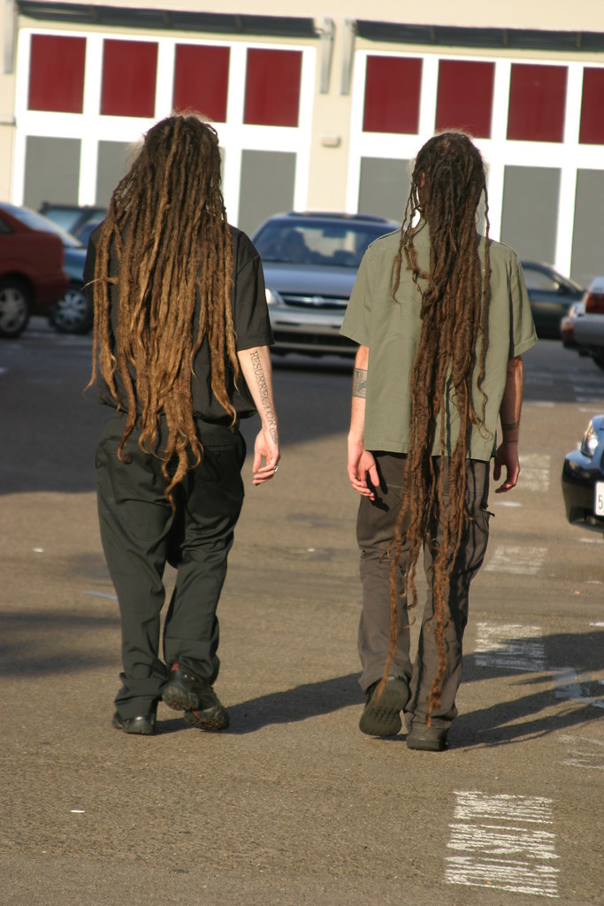Two Dreads Two men with dreadlocks stroll by, downtown San… Flickr