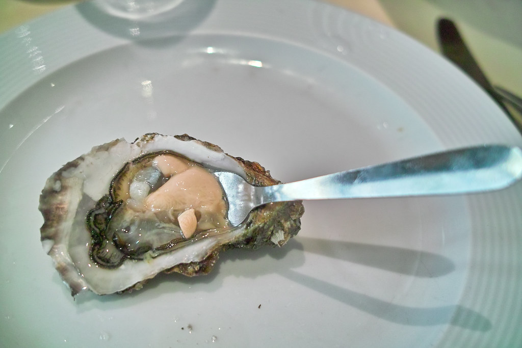 A oyster in French banquet style seafood dinner llee_wu Flickr