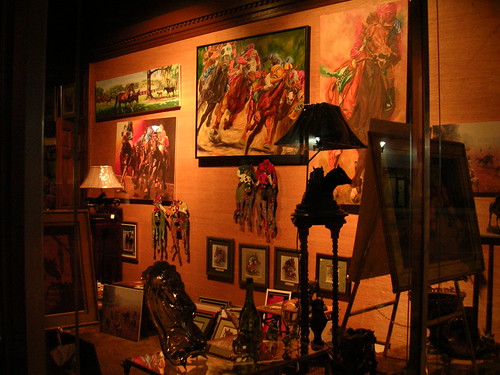 Downtown Ocala shop window, after hours. Ron Helzer Flickr