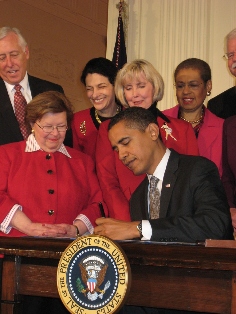 President Obama signs the Lily Ledbetter Act into Law Flickr