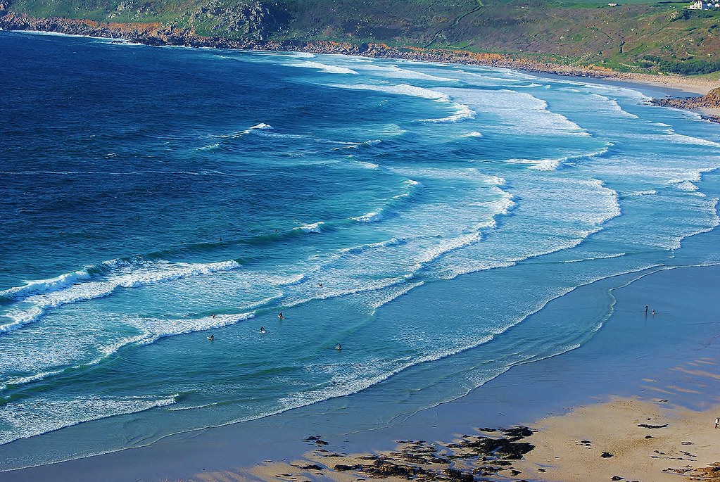 The blue waves in sennon + ant sized surfers Lawrie Cate Flickr