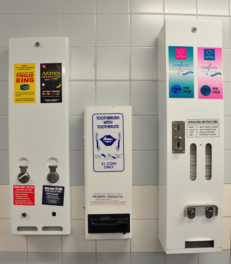 bathroom vending machines Maxi pads, tampons, toothbrush a… Flickr