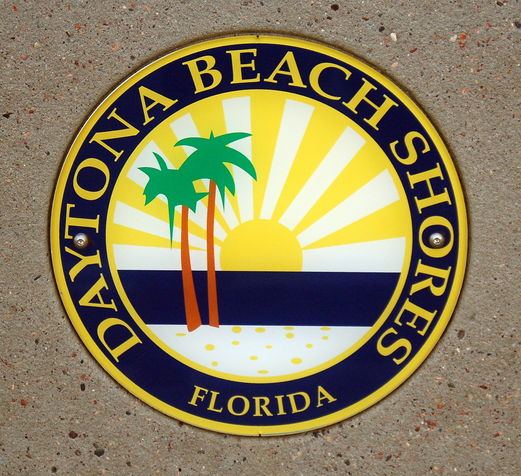 City Seal Daytona Beach Shores city logo on a bus bench. Thomas
