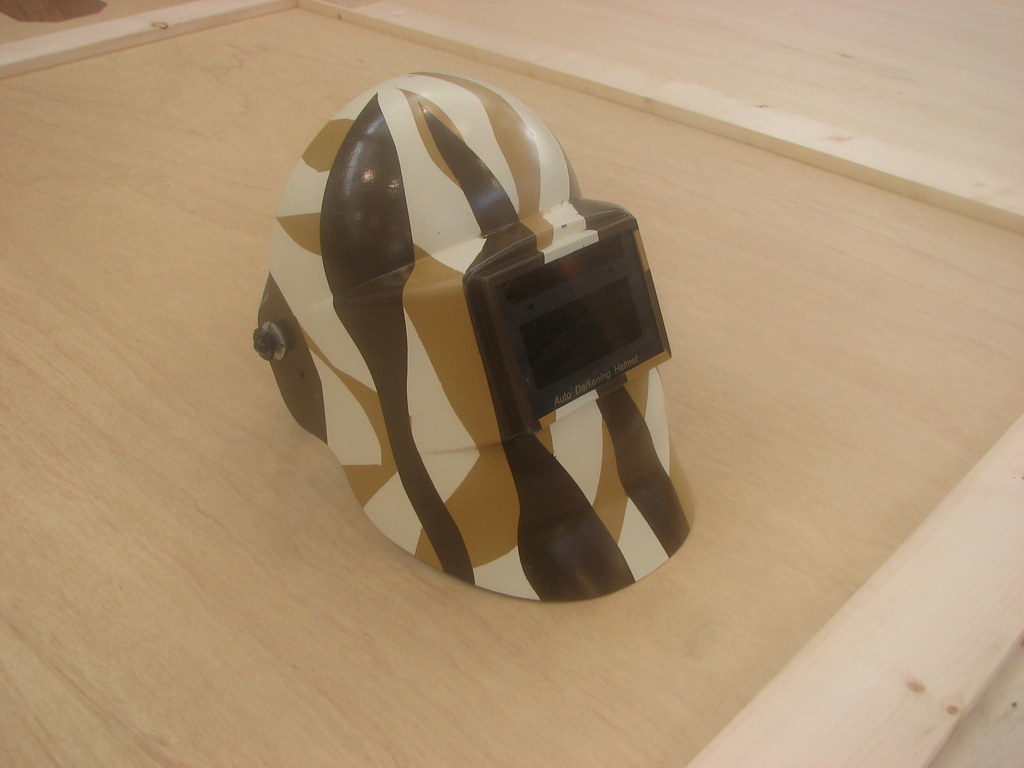 Painted welding hood Montanna Gold paint. cchauvet Flickr