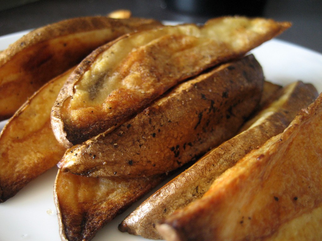 roasted potatoes Potatoes wedges tossed with olive oil, sa… Flickr