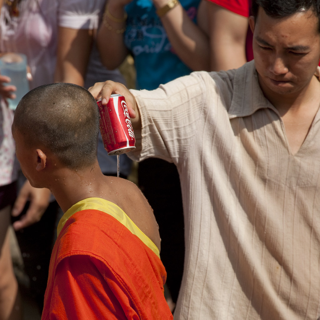 Monk shower in Pimai time! Laos During Pimai, the monks go… Flickr
