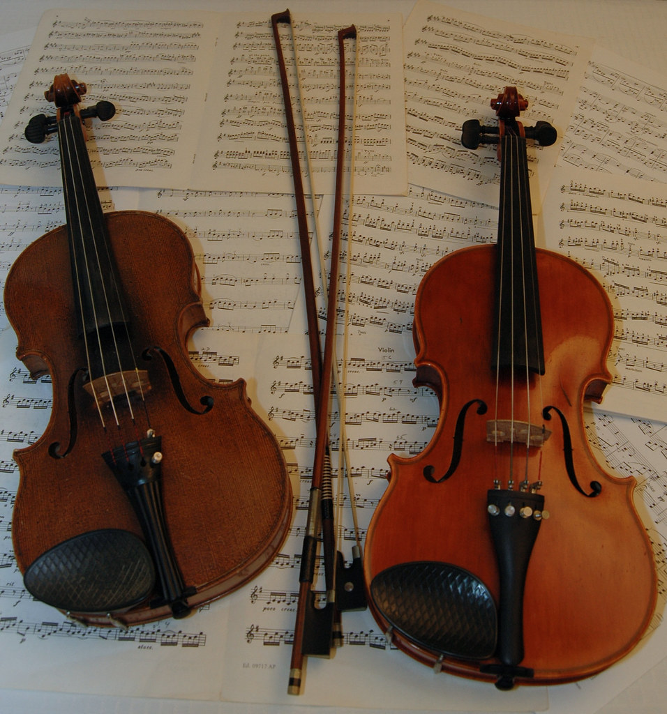 Violins with bows and music Photo Phiend Flickr