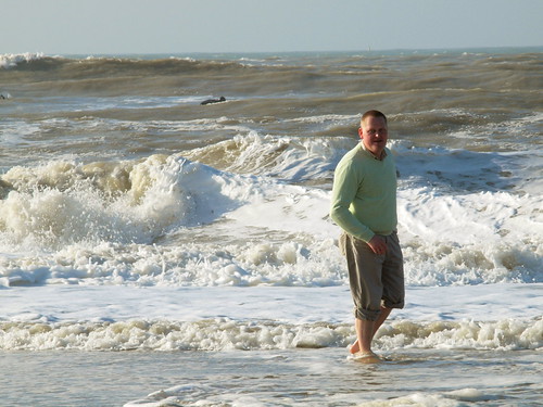 come on in, the waters lovely! man paddling in a choppy se… Flickr