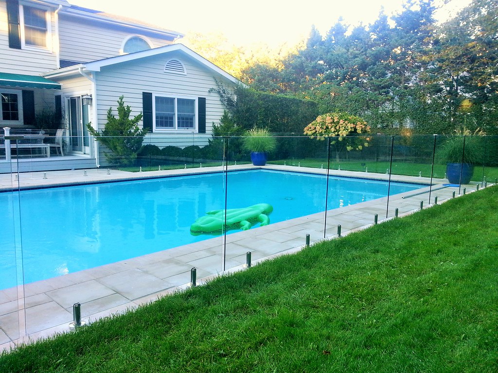 Glass Fence A good and unique way to fence in a private po… Flickr