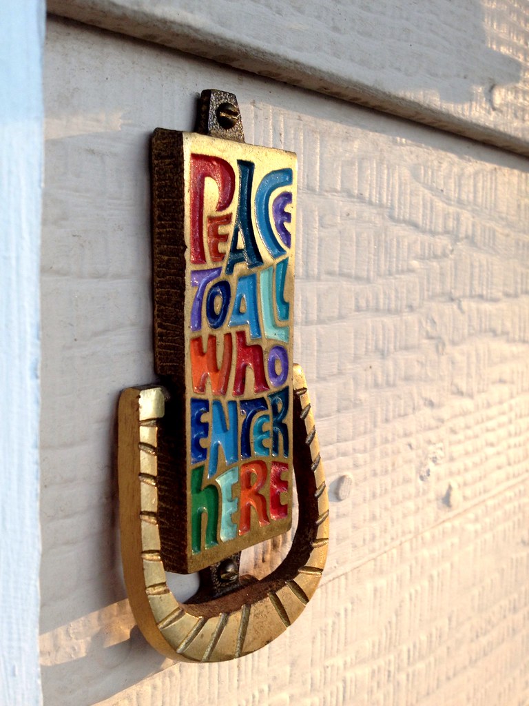 Awesome Peace To All Who Enter Here Door Sign background wallpaper