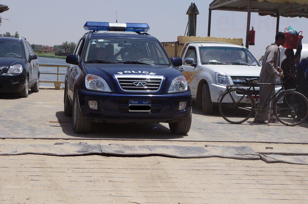 Our Police Escort Our car at left both still on the ferr… eLaReF