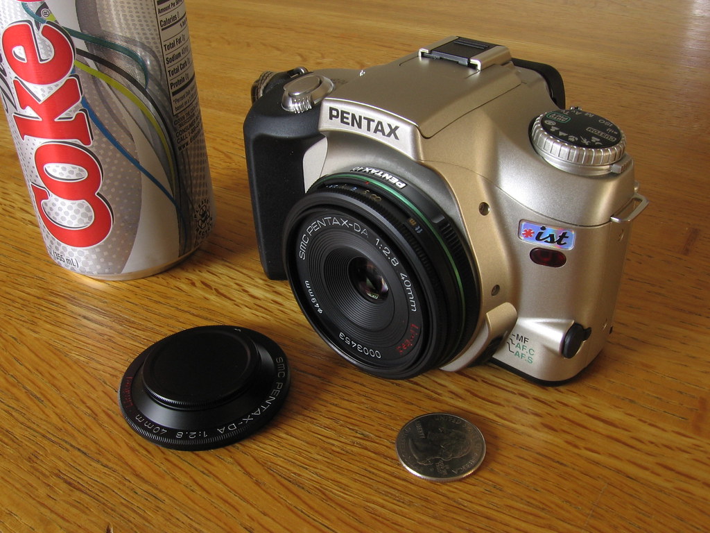 World's smallest 35mm AF SLR The Pentax *ist 35mm SLR with… Flickr