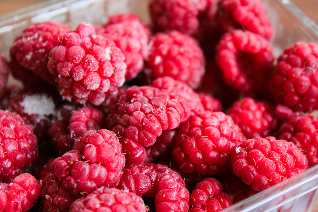 Frozen raspberries Closeup on frozen raspberries. The top… Flickr