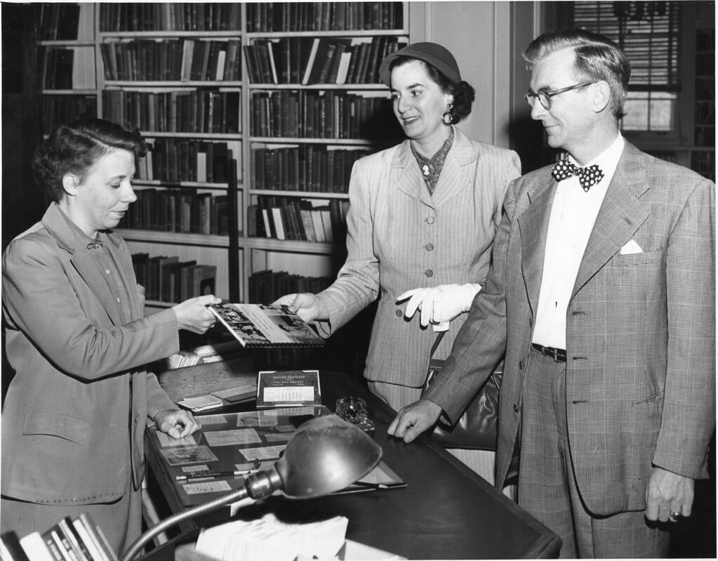 1958 nursing book donation Librarian Lottie Driver, left, … Flickr