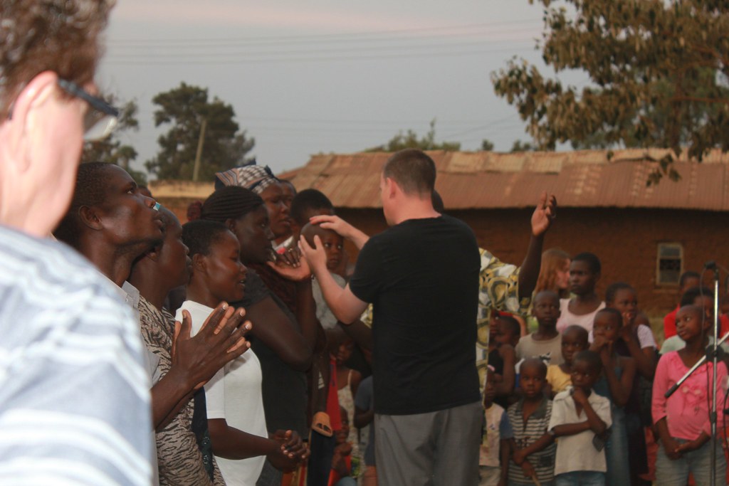 Praying Pastor Kelly Stickel street preaching Victory Church