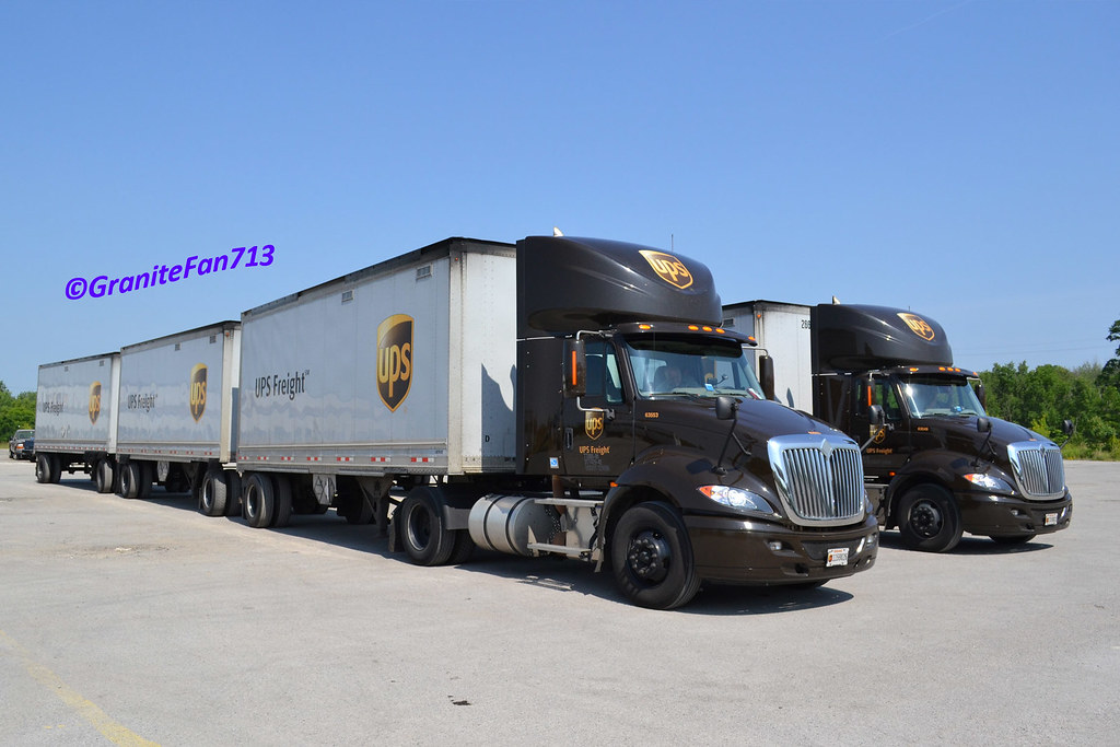 UPS Freight International ProStars with Triples Trucks, Buses