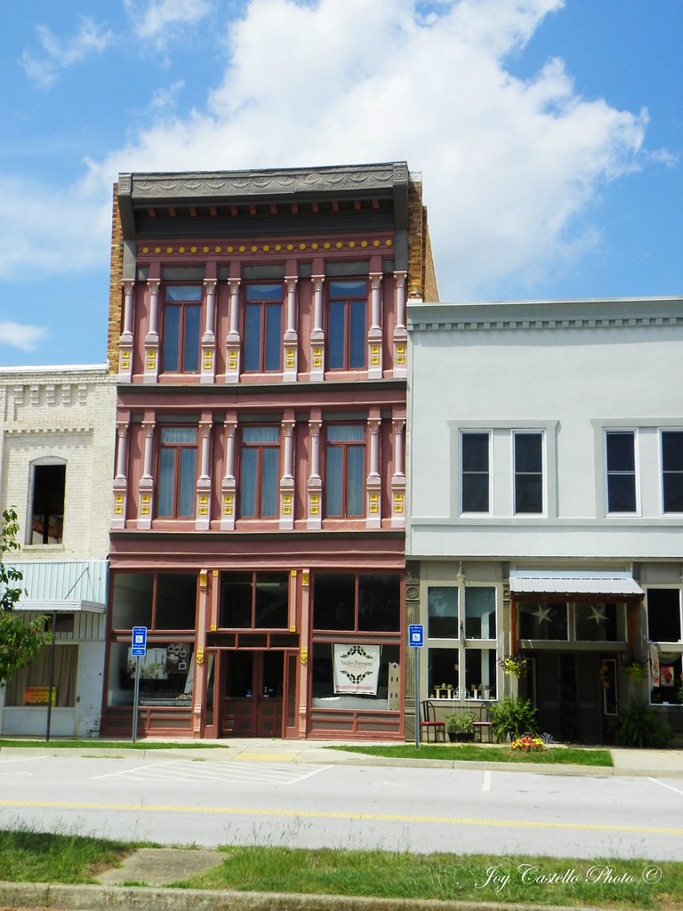 Three Story Building Comer, Joy Castello Flickr