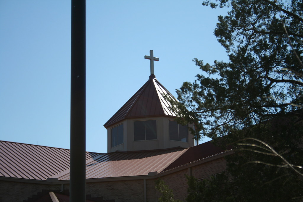 St. John Vianney's Catholic Church The church's metal roof… Flickr