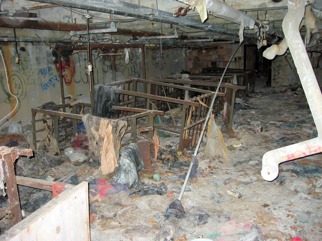 bunkbeds In a basement, overturned bunk beds among abando… Flickr