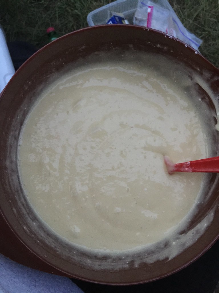 Making apple dump cake in the Dutch oven Alexandria Jackman Flickr