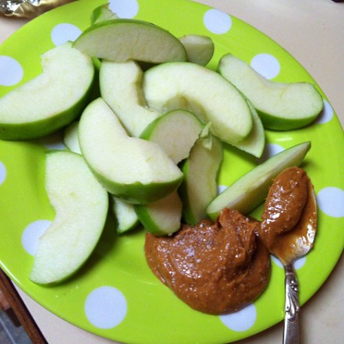 Late night snack, organic apple and peanut butter with a s… Flickr