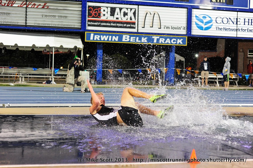 A steeplechase competitor falls during the 2013 NCAA East … Flickr