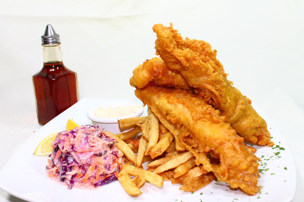 Fish & Chips Fish and Chips, sea bass dredged in a very li… Flickr
