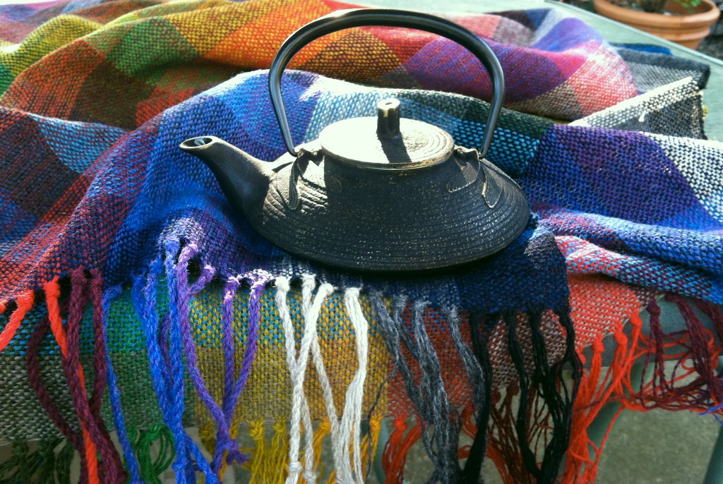 A way to keep tea warm and hold fringe for twisting Flickr