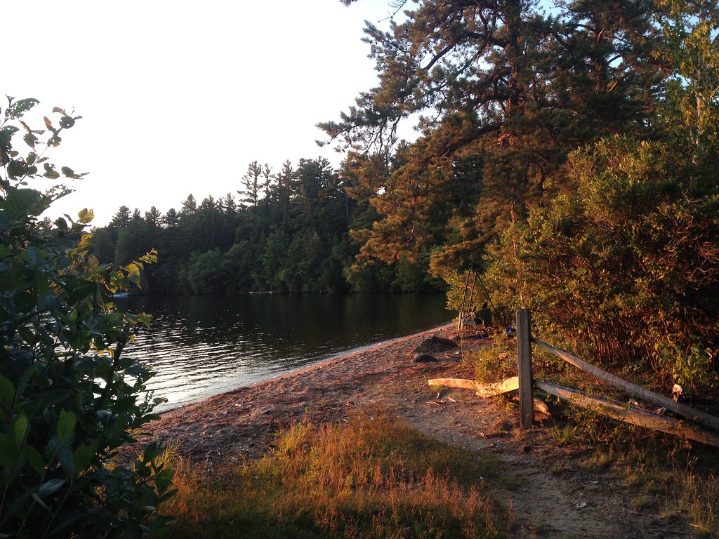 Sunset on lake beach with swing Betsy Devine Flickr