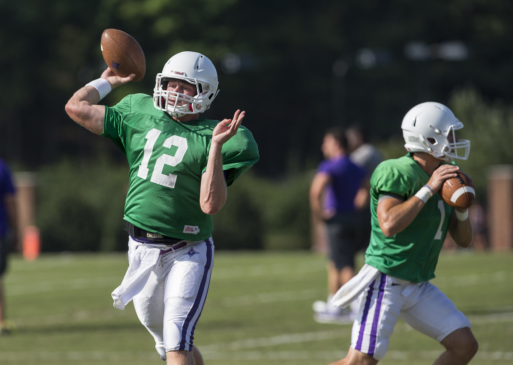 Furman Football quarterbacks warming up Furman Football qu… Flickr