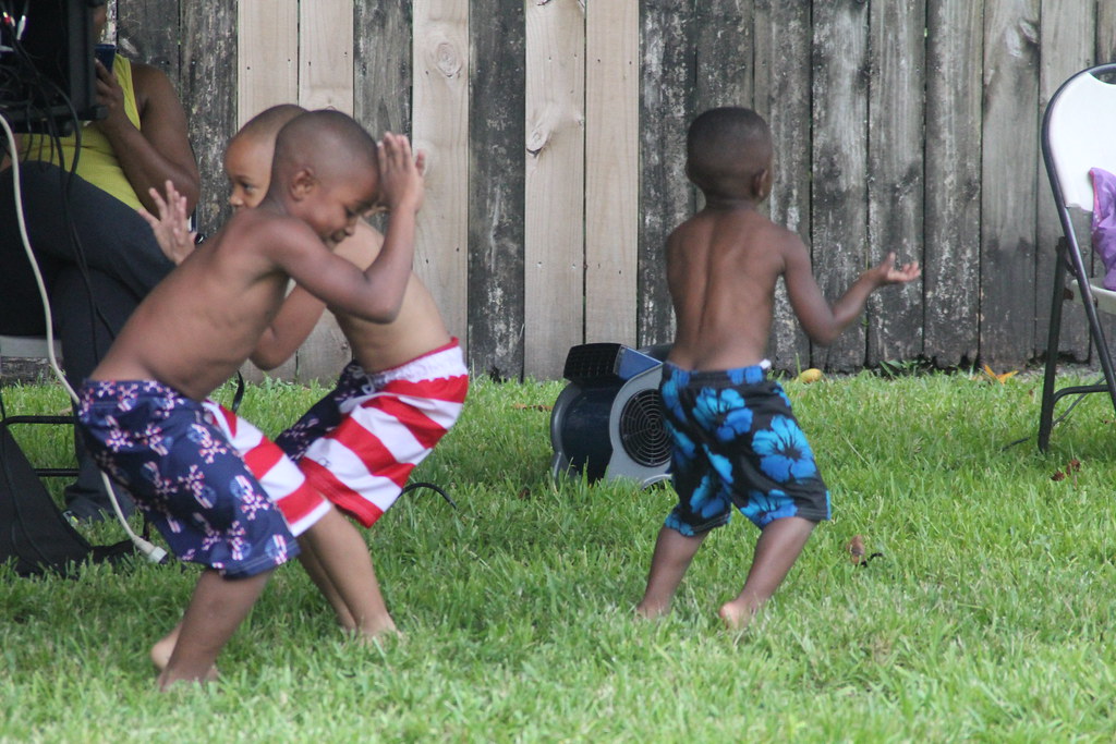 Little boys dancing Reuben White Flickr