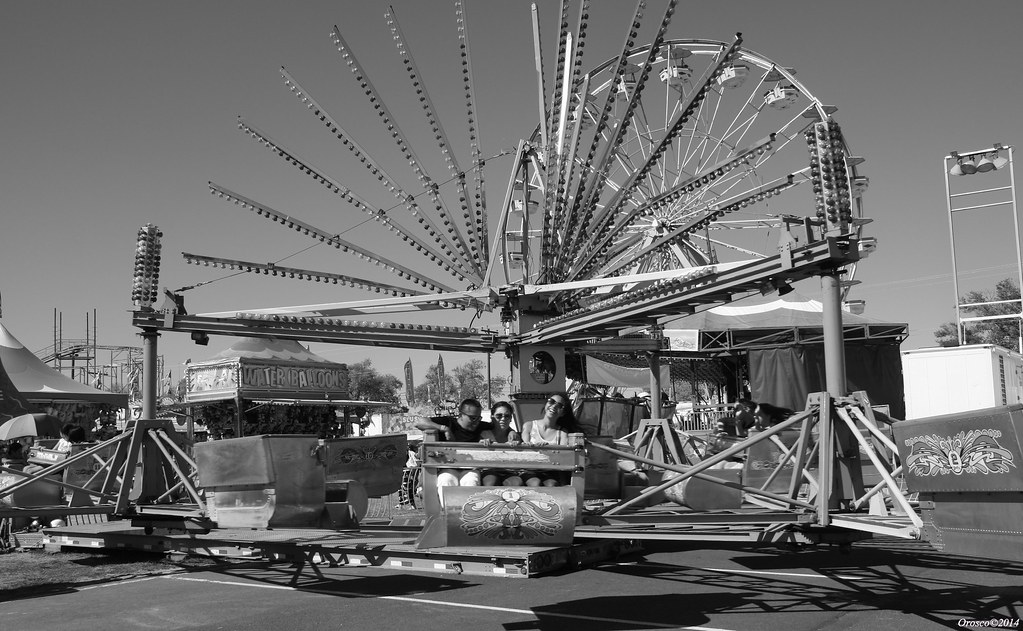 Fair Ride B & W A group of people having fun on one of the… vmf214