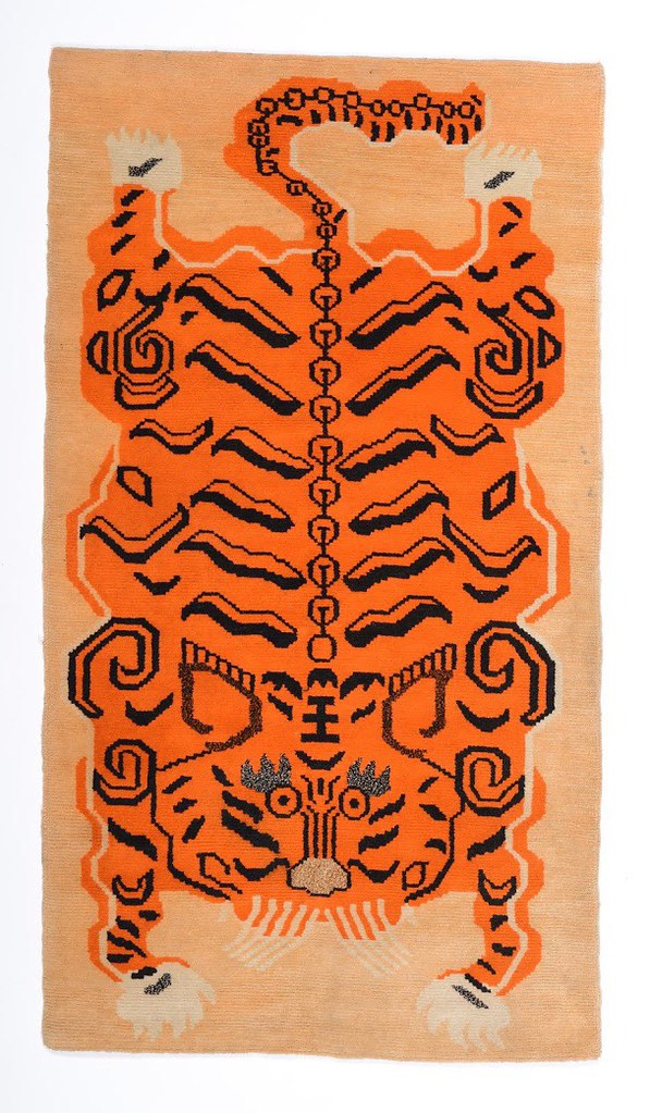 Antique Tibetan Tiger Rug This handmade antique Tibetan ti… Flickr