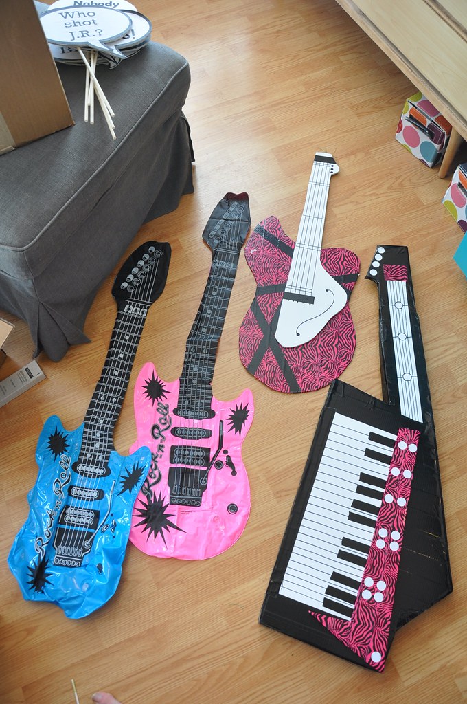 photo booth props inflatable guitars, onedimensional gui… Flickr
