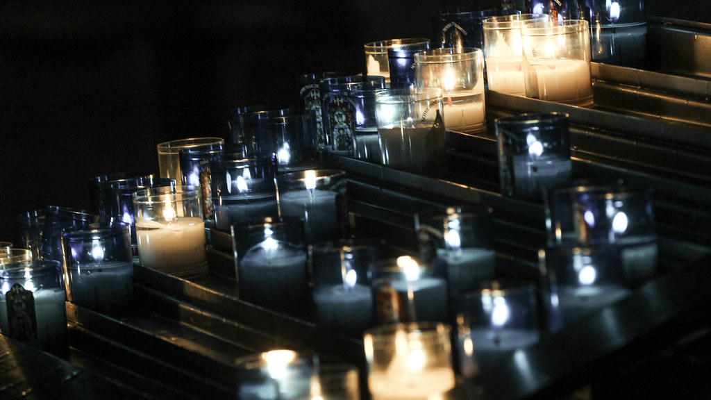 Prayers to Our Lady Votive candles in the blue of Our Lady… Flickr