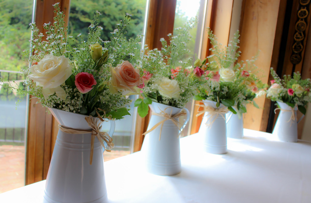 Jugs of Flowers A recent wedding table décor. tracy dicker Flickr