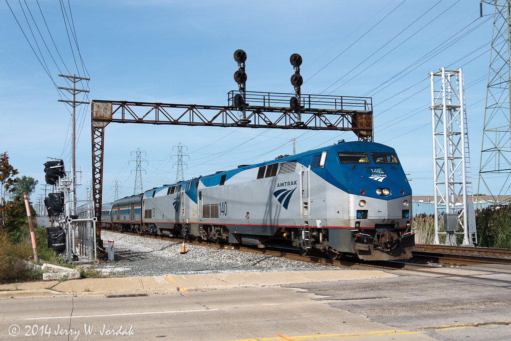 Amtrak and an NYC sentinel Amtrak's Lake Shore Limited, ru… Flickr
