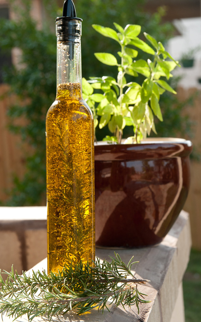 olive oil refilling the olive oil bottle. I put fresh rose… Flickr