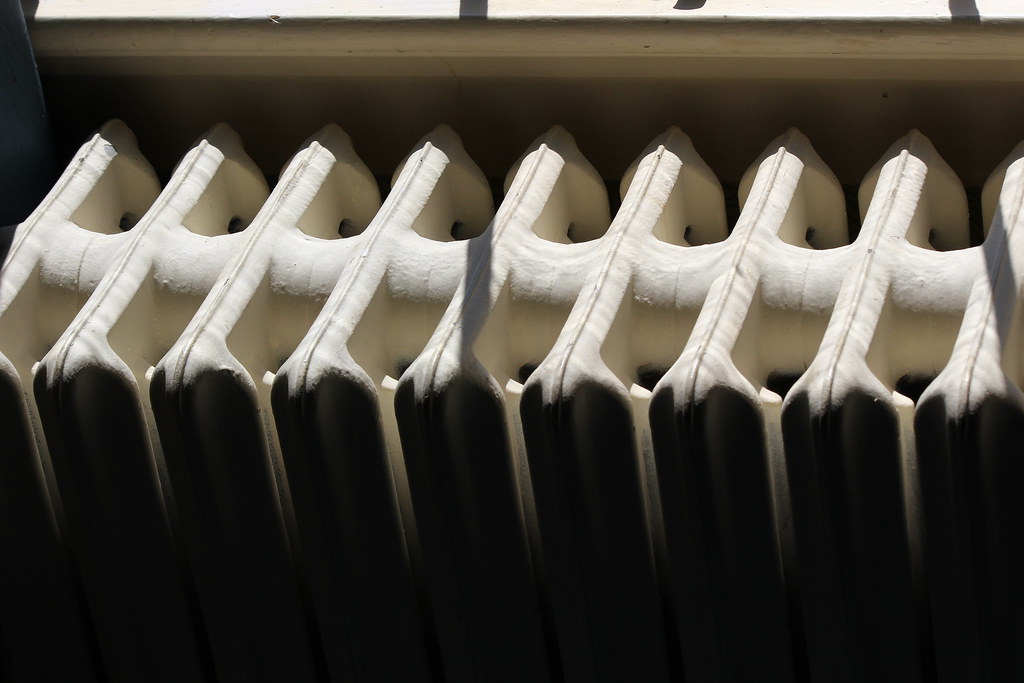 Radiator The sun rolling across an old heater at the Sam B… Flickr