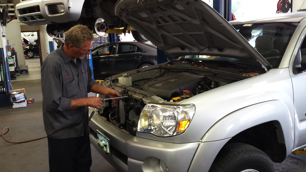 Steves Auto Repair and Tire replacing the air conditioning… | Flickr