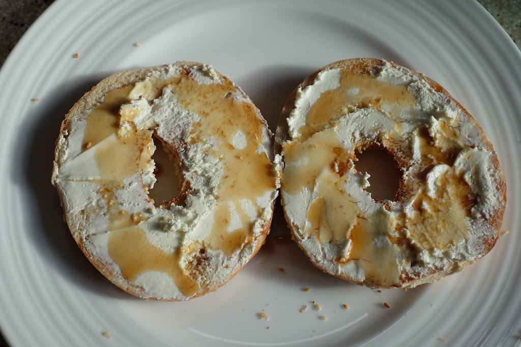 Cream cheese sesame bagel with maple syrup. say_cheddar Flickr