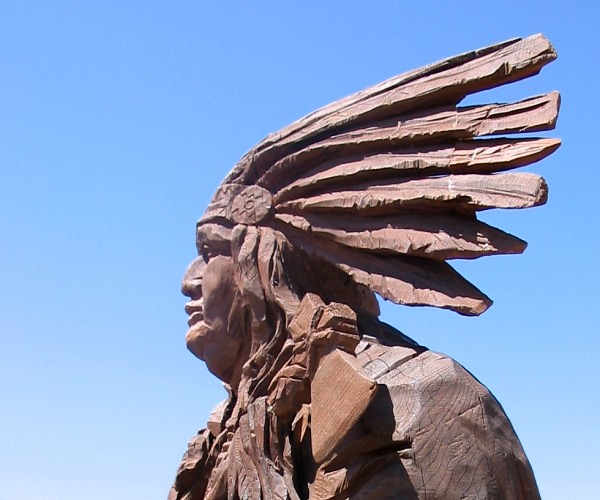 A statue at The Canadian Carver Near Pancake Bay ndh Flickr