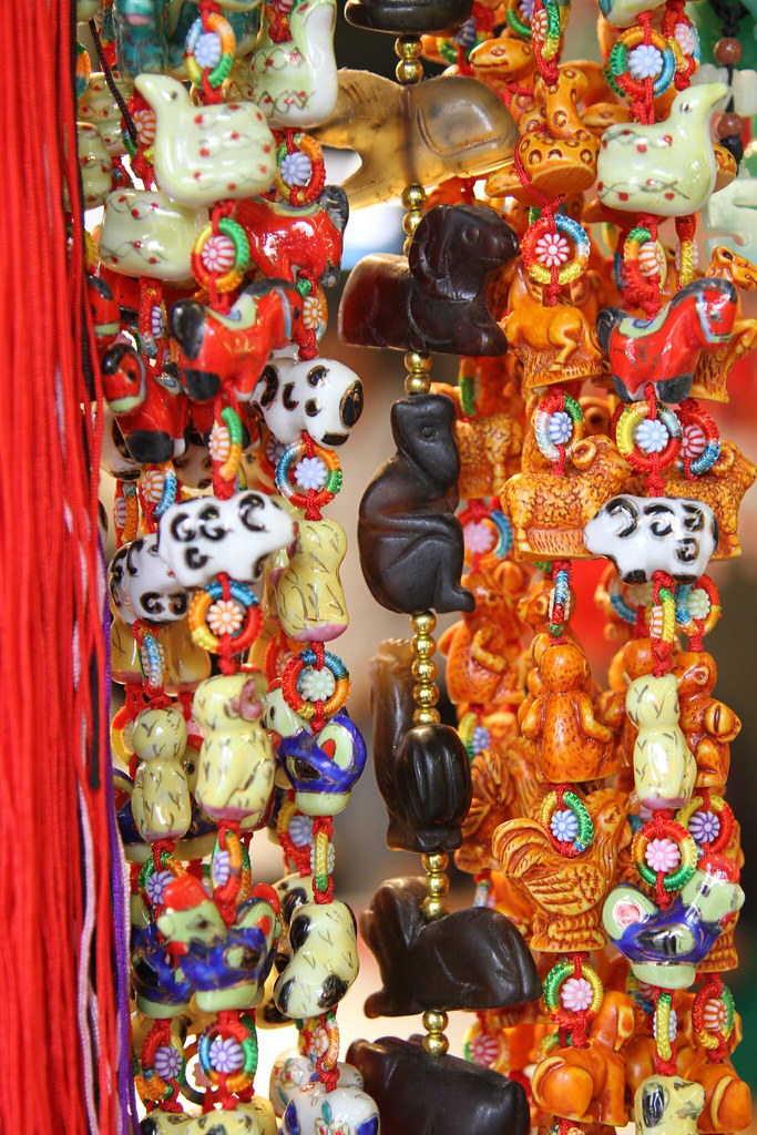 Good luck charms Good luck charms hanging at a store outsi… Flickr