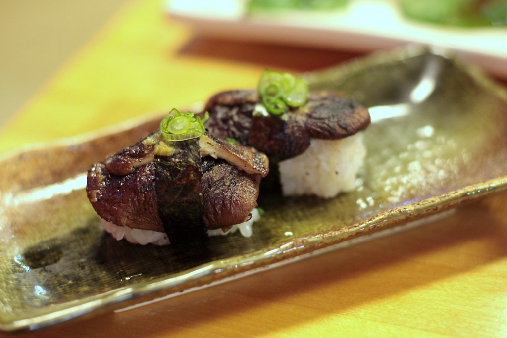 shiitake nigiri Mmm, smokey and spicy. So good. rosidae Flickr