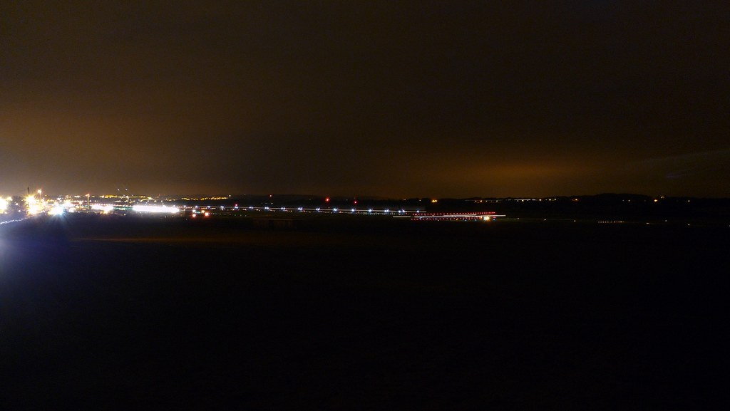 Edinburgh Airport With a plane taxiing to the main runway Spoons