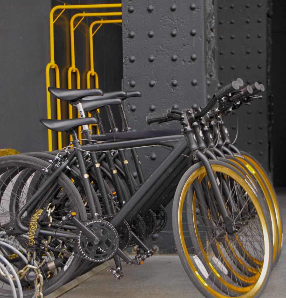 golden wheels Bicycles with their golden wheels. There mus… Flickr